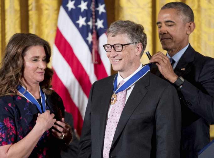 Bill Gates Receiving a Medal from President Obama